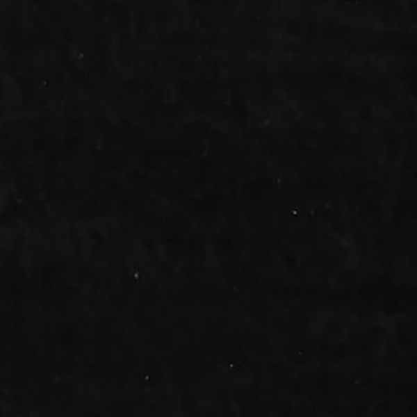 A close up of a black background with white dots on it.
