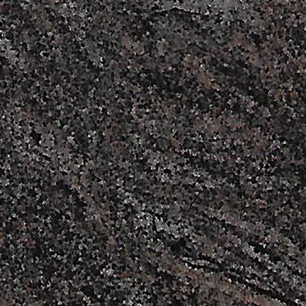 A close up of a black granite counter top.