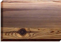 Wood grain pattern with knots.
