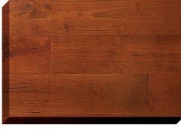 Close-up of hardwood flooring; warm brown color with visible wood grain and knots.