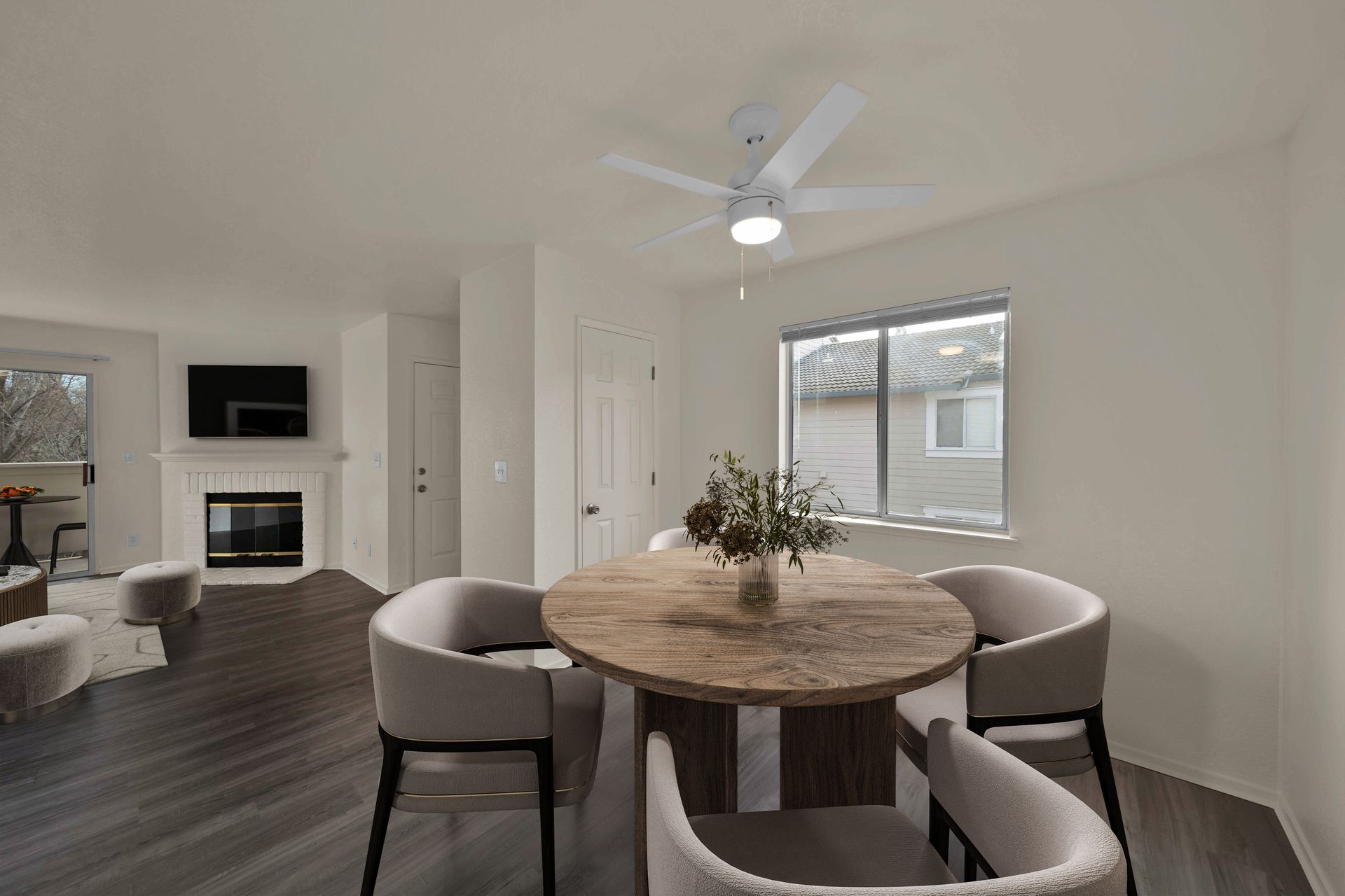 2 Bedroom, 2 Bathroom - Dining room with view into living room and fireplace.