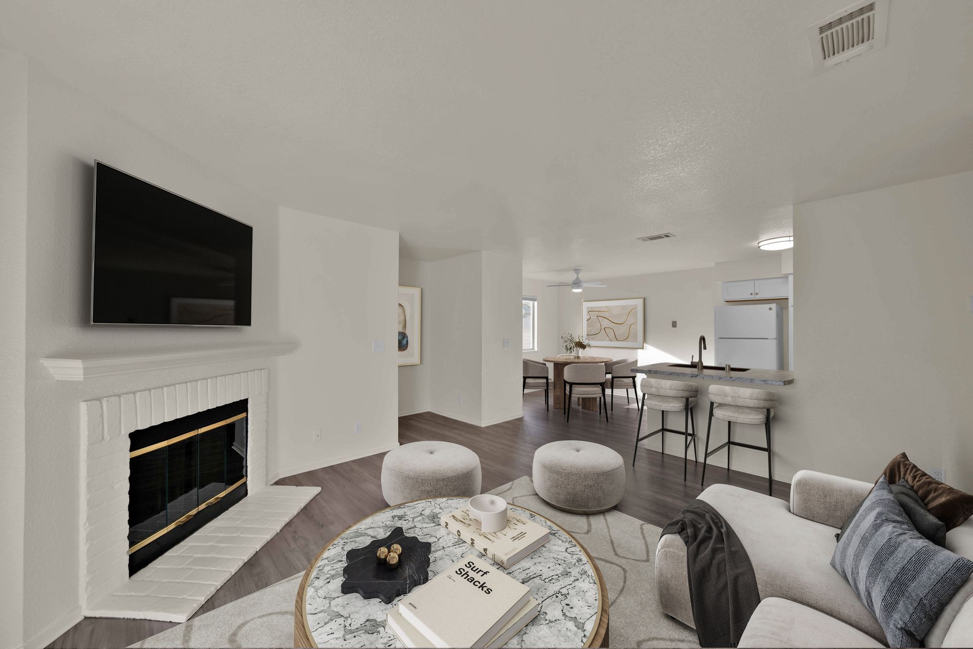 2 Bedroom, 2 Bathroom - Open concept living area with view into kitchen and dining room.