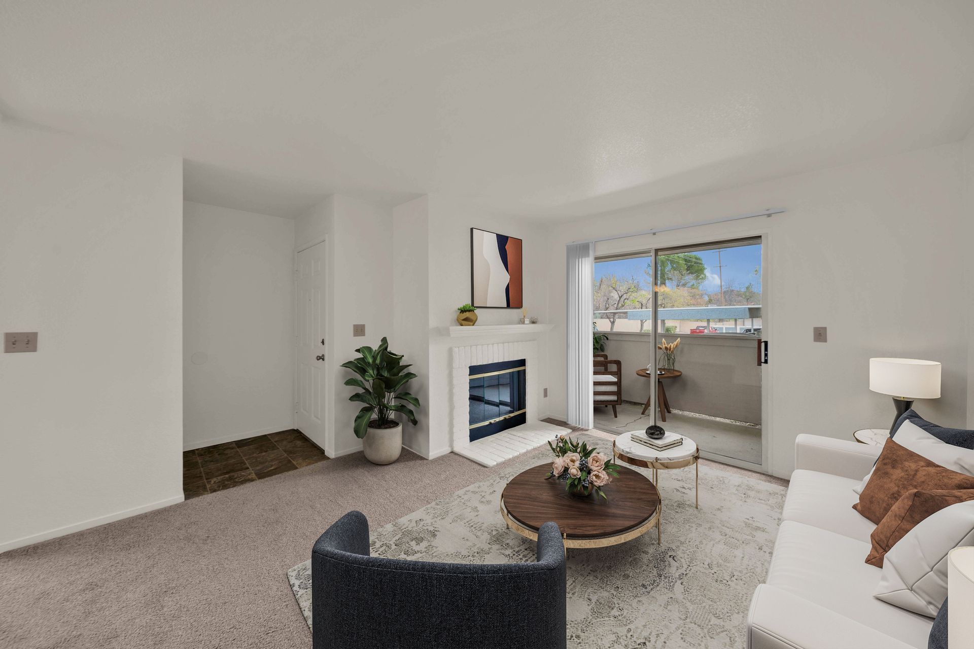 1 bedroom, 1 bathroom -living room with view of fireplace and patio/deck