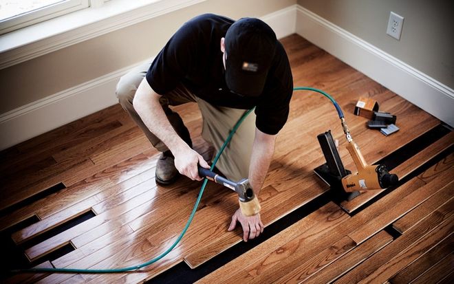 Man Repairing Floor