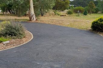 curving asphalt driveway