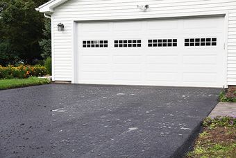 driveway with white garage