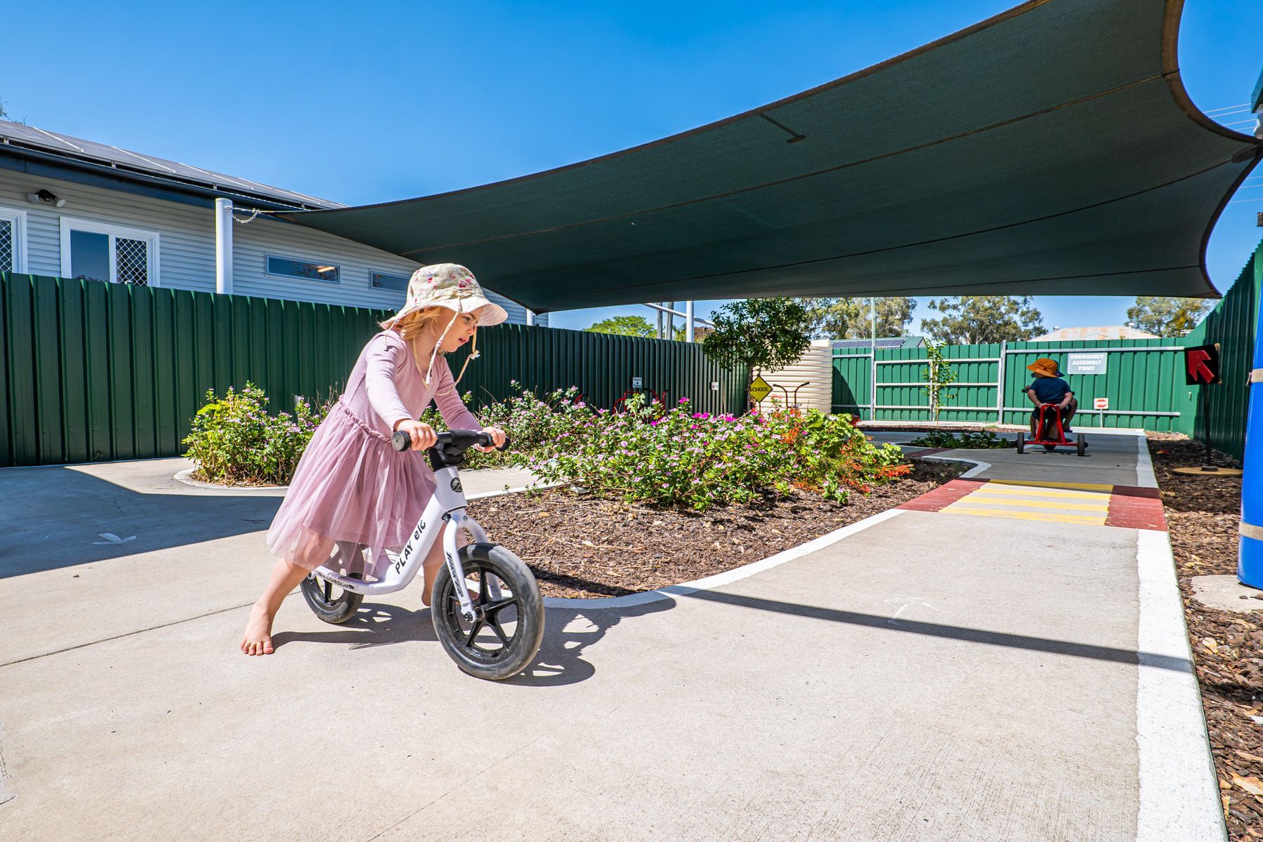 Little Girl Riding a Bike