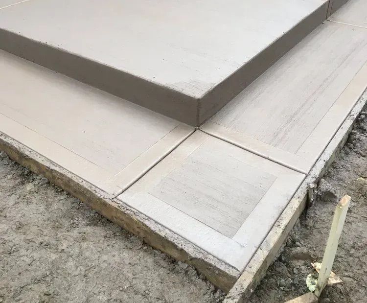 A close up of a concrete staircase being built.