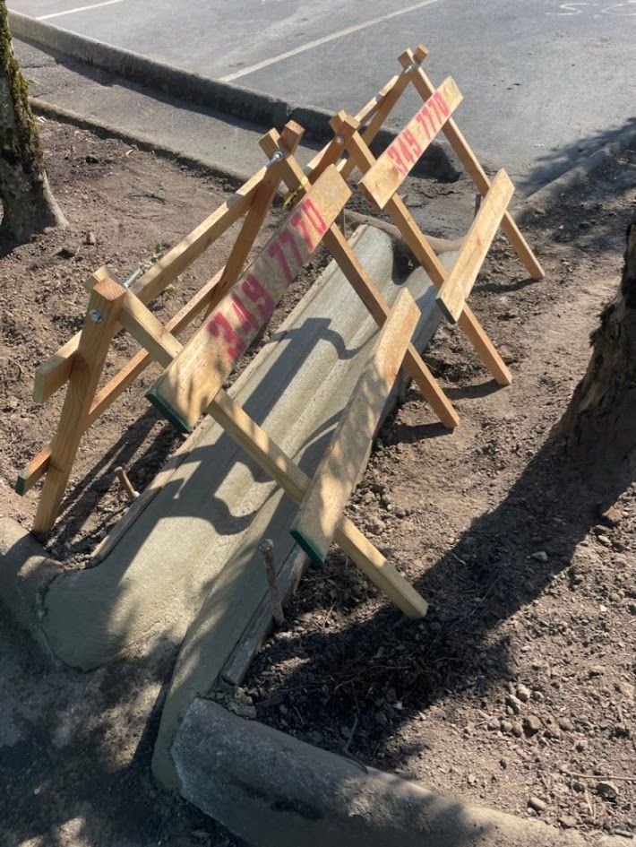 A wooden barrier with the number 219 on it