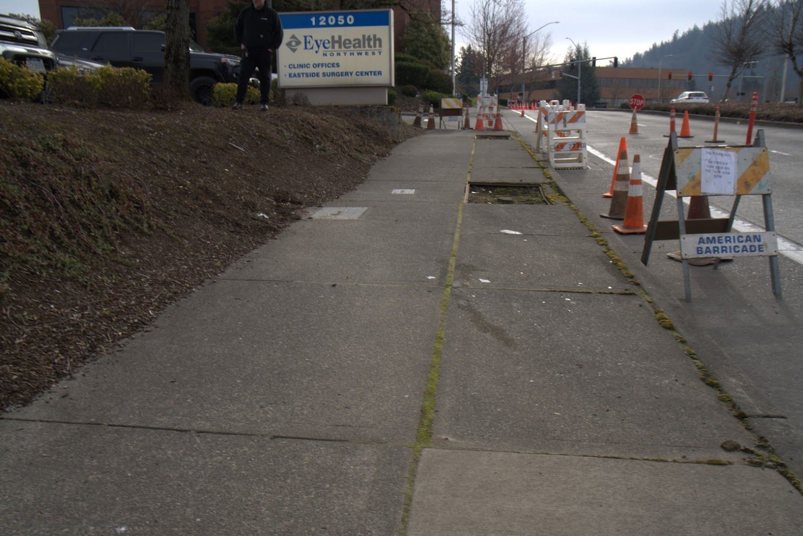 A sidewalk with a sign that says eyehealth on it