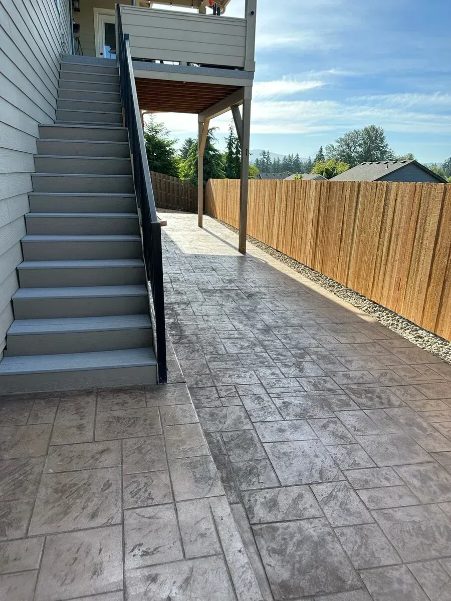 A set of stairs leading up to a wooden deck