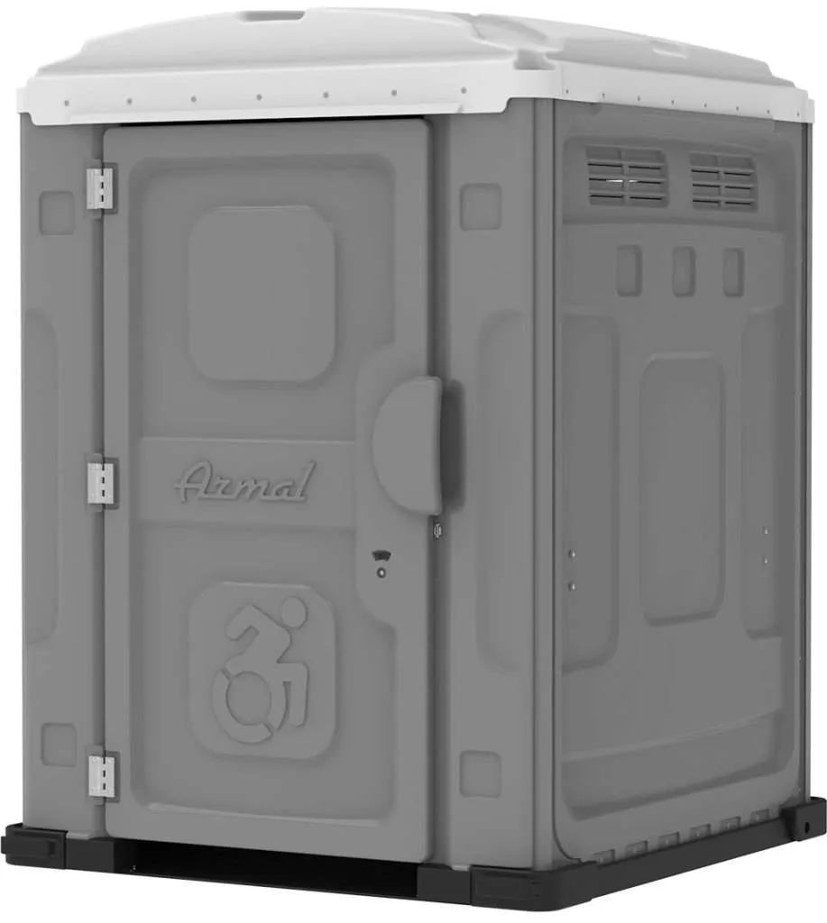 Gray portable toilet with white roof, a sign for wheelchair access.