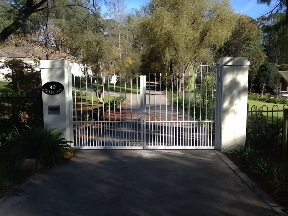 A White Gate with the Number 41 on It — Southern Gate Automation in Mittagong, NSW