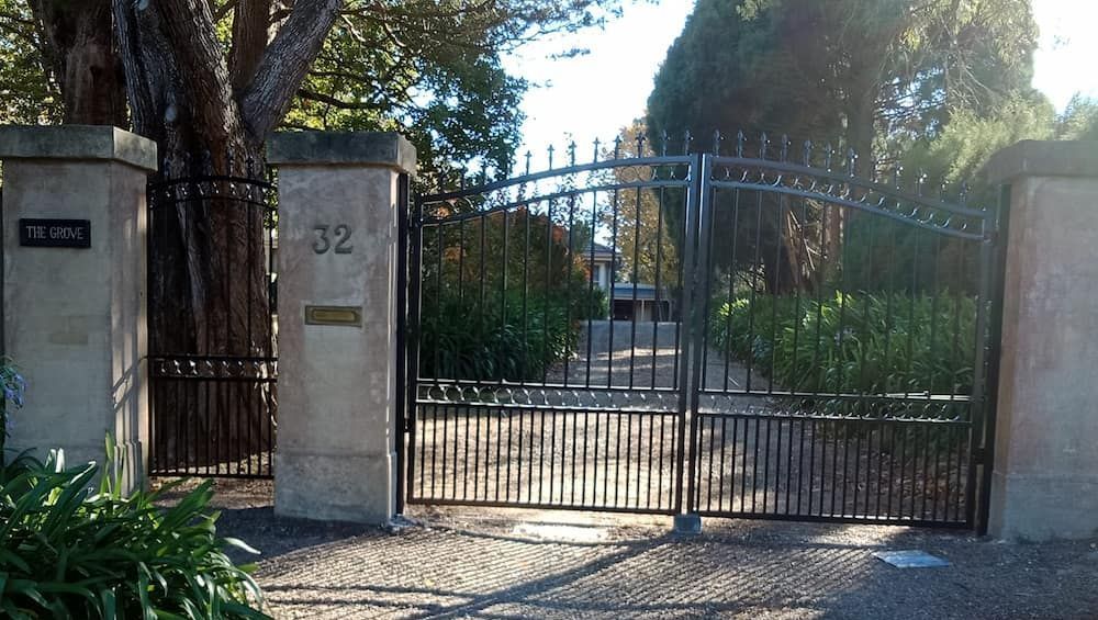 A Wrought Iron Gate with the Number 32 on It — Southern Gate Automation in Mittagong, NSW