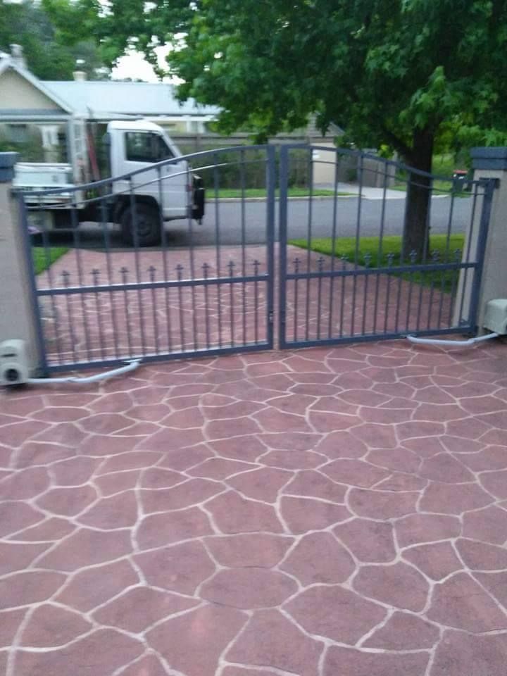 A White Truck is Parked in Front of a Gate — Southern Gate Automation in Mittagong, NSW