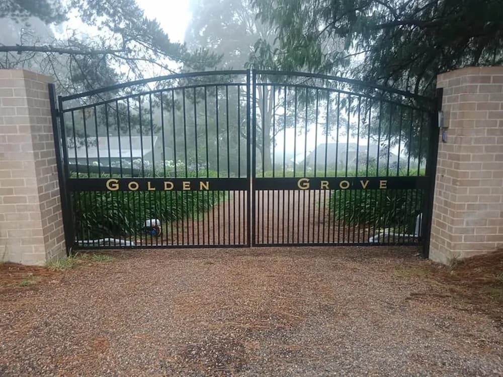 A Black Gate with the Words Golden Grove on It — Southern Gate Automation in Mittagong, NSW