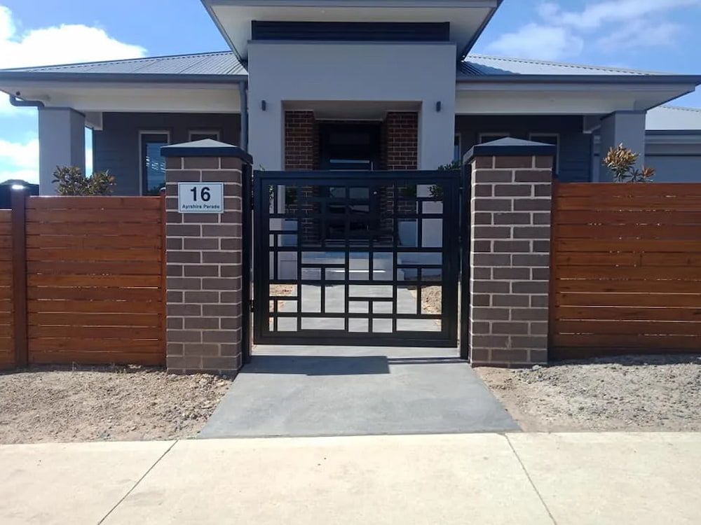 A House with the Number 16 on the Front of It — Southern Gate Automation in Mittagong, NSW