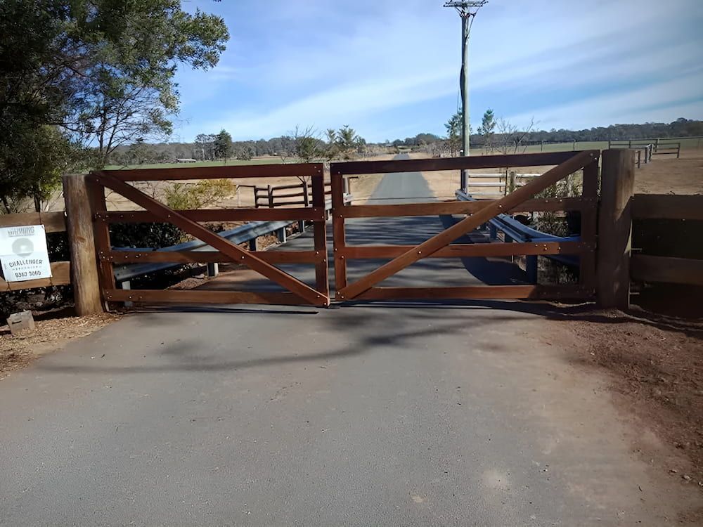 A Wooden Gate on the Side of a Road — Southern Gate Automation in Bowral, NSW