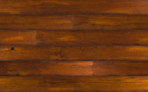 Dark stained wooden floorboards.