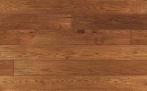 Wooden floorboards in shades of brown and tan, laid horizontally.