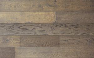 Wood flooring with various shades of brown and natural grain patterns.
