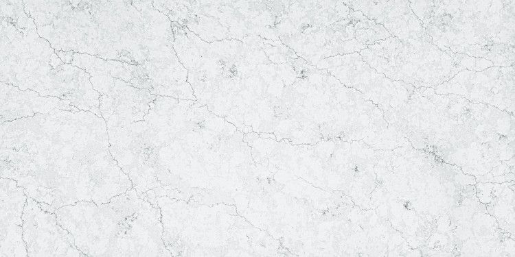 White marble countertop with subtle gray veining.