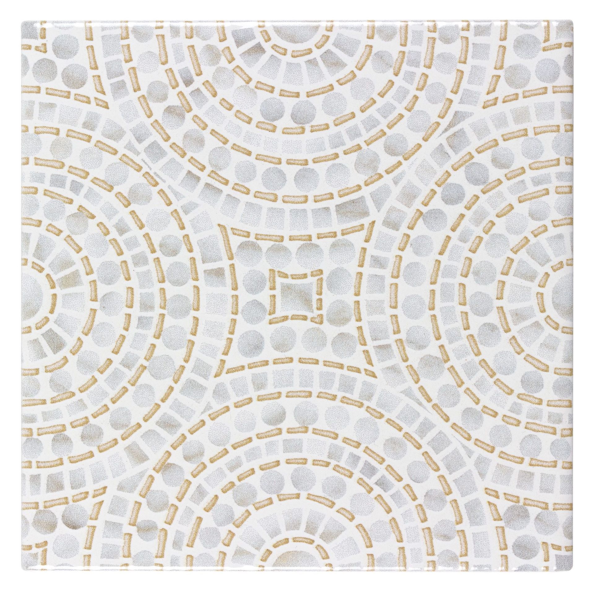 Mosaic tile with gold and gray concentric circles on a white background.