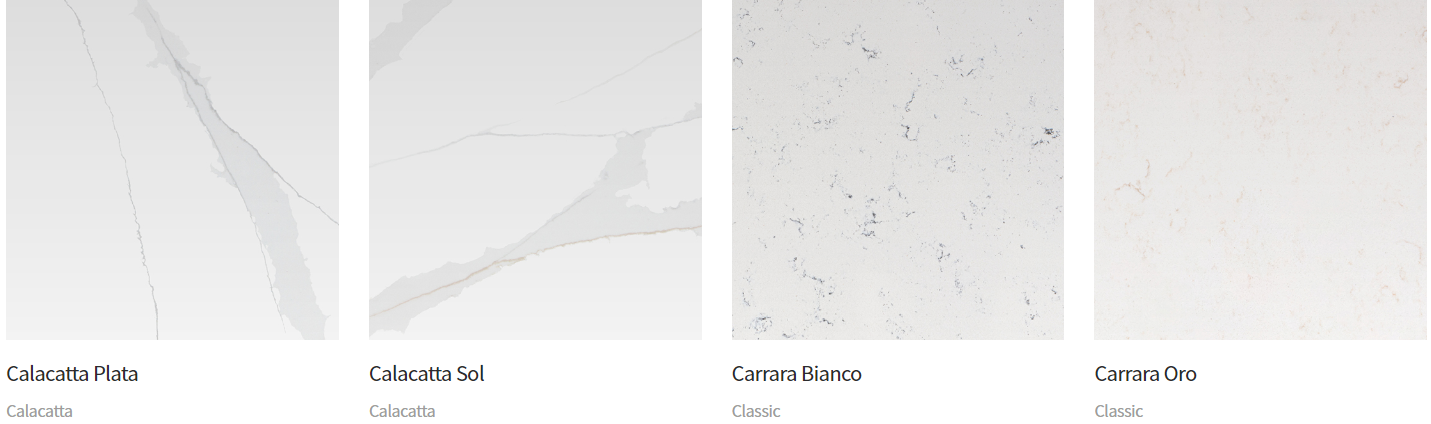 Four white countertop samples with variations in texture and pattern.
