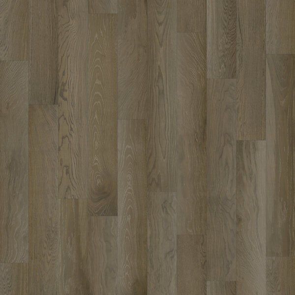 Wooden plank flooring in shades of brown and gray.