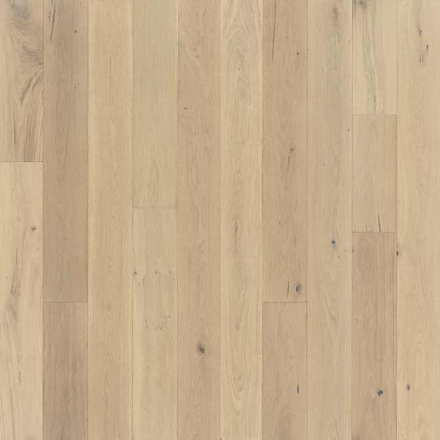 Light-colored wooden floorboards, vertical grain pattern.