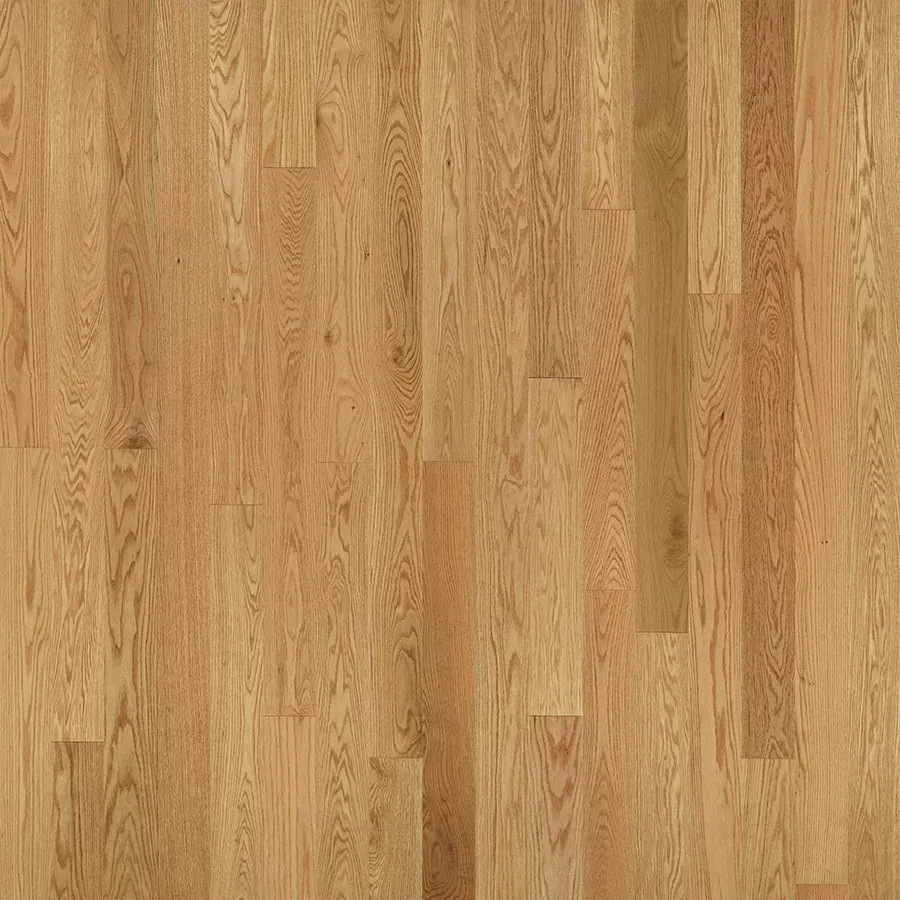 Light-colored wooden floorboards with vertical grain and varying shades of tan and brown.