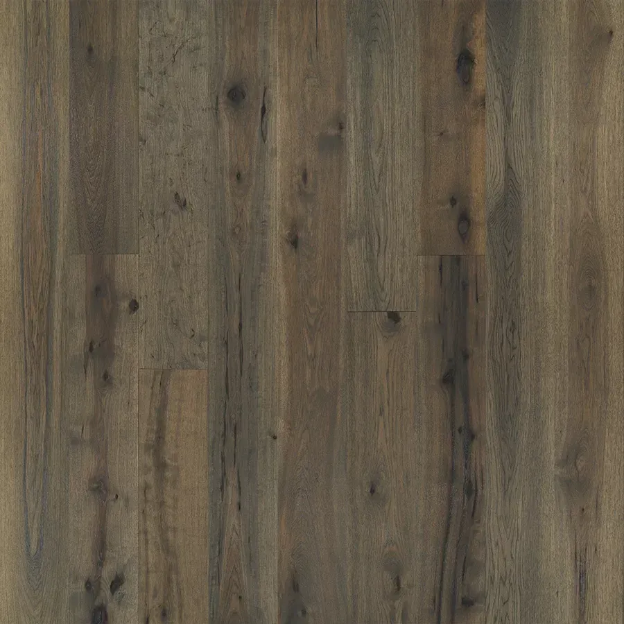 Dark brown wood floor with a rustic, weathered appearance.