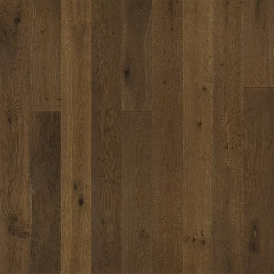Dark brown wood floor planks with visible grain and knots.