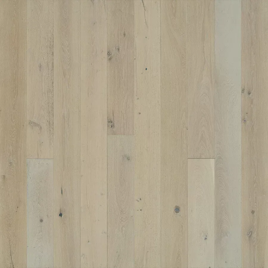 Light-colored, pale wood flooring with a subtle grain pattern and occasional dark knots.