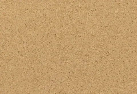 Close-up of beige quartz countertop with fine-grained texture.