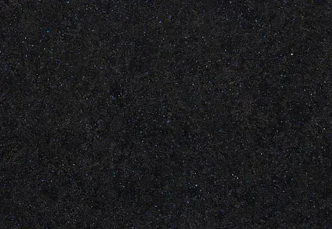 Dark, textured surface with subtle highlights, possibly a close-up of a black object or material.