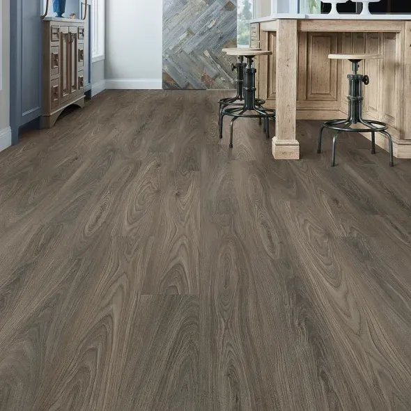 Wooden-look flooring with a rustic aesthetic, spanning from foreground to kitchen in a room.