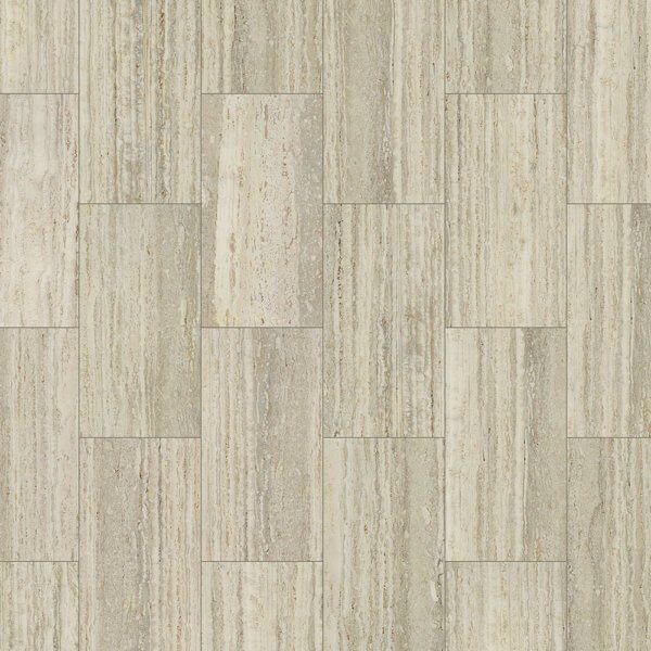 Beige and tan stone tile floor with vertical veining in a brick pattern.