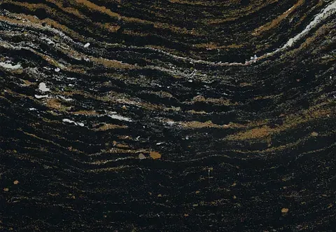 Dark countertop with black, gold, and white swirling veins.