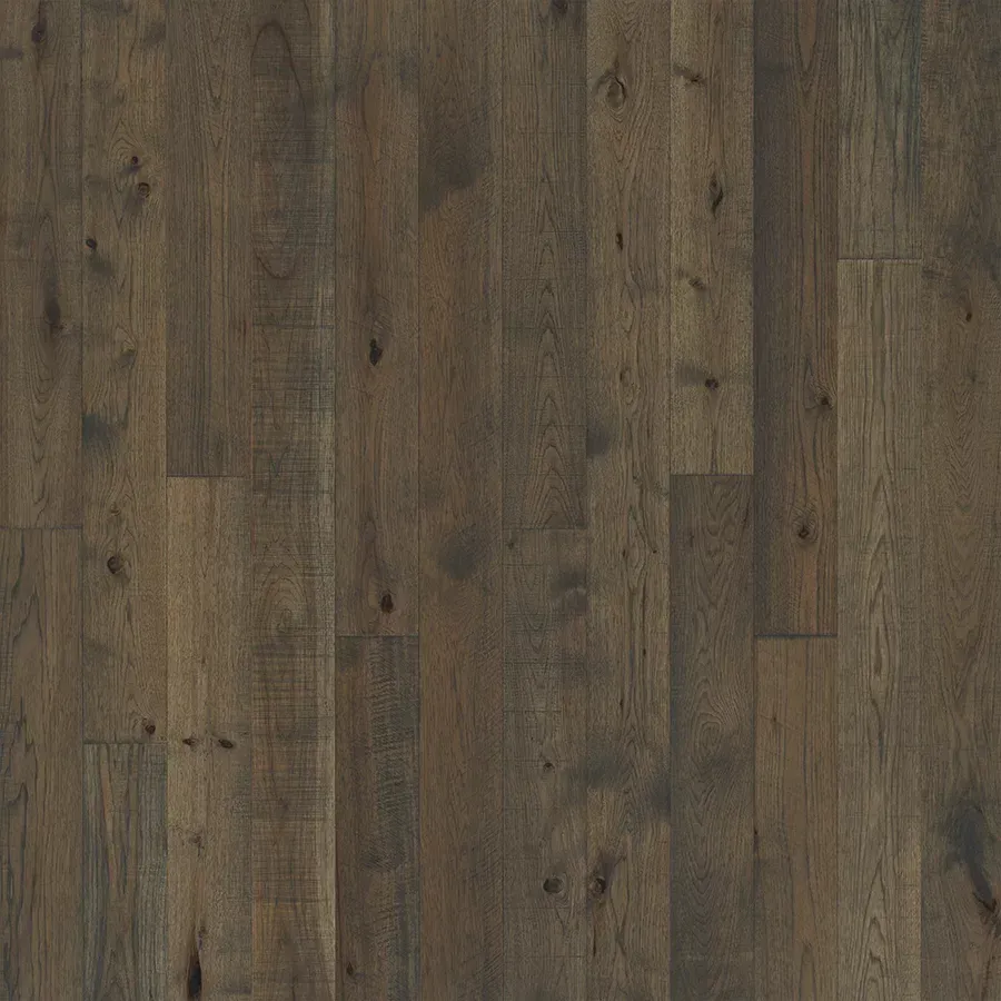 Dark brown hardwood flooring with a textured surface.