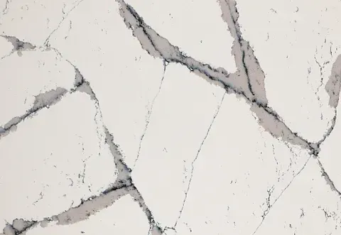 White marble surface with grey veining.