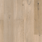 Light-colored hardwood flooring, showcasing wood grain and knots.