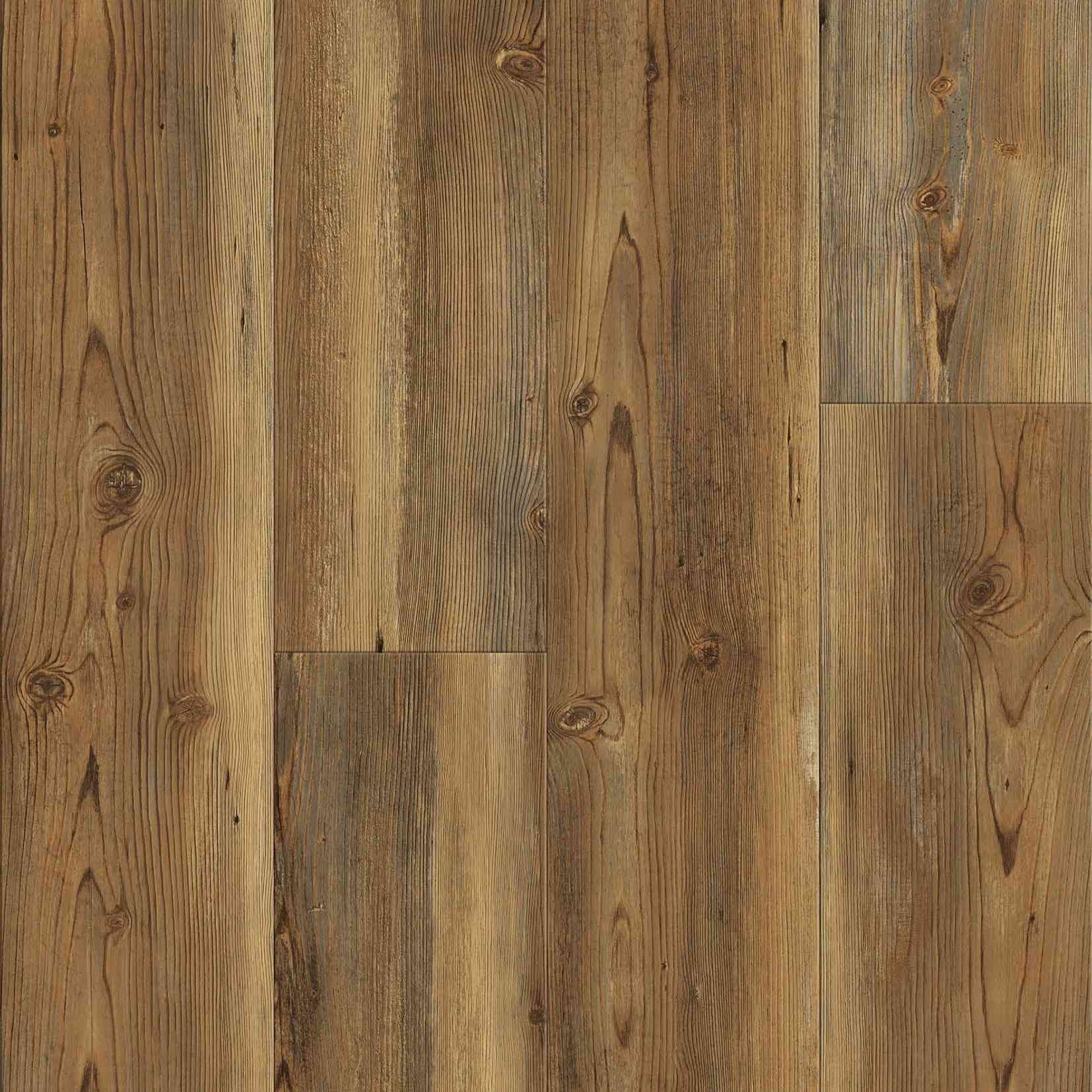 Wood-look flooring in shades of brown and tan with vertical grain and knots.