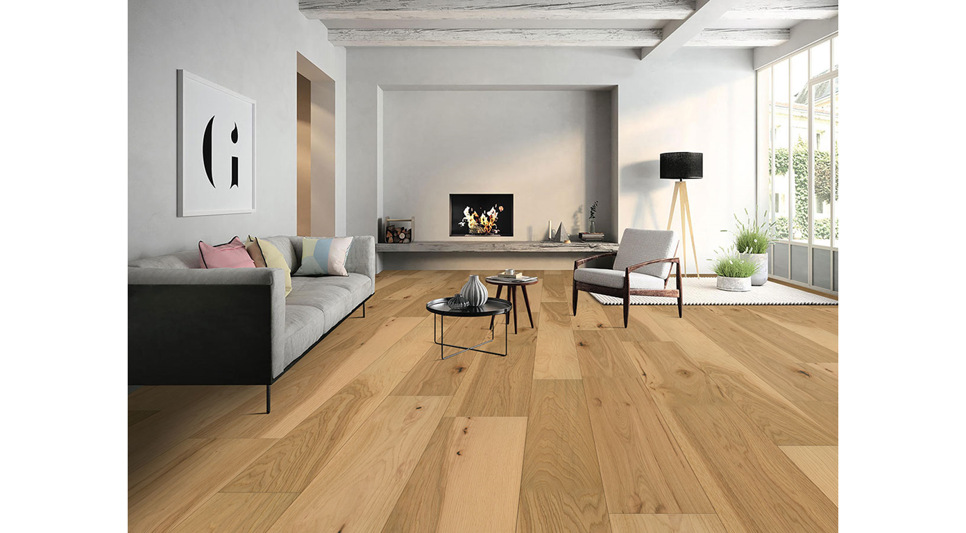Modern living room with light wood floors, fireplace, and neutral-toned furniture.