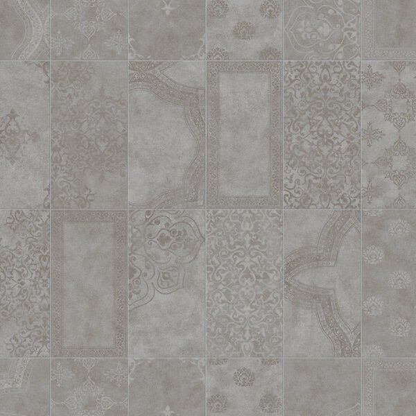 Patterned gray tiles in various shapes and designs, creating a textured surface.