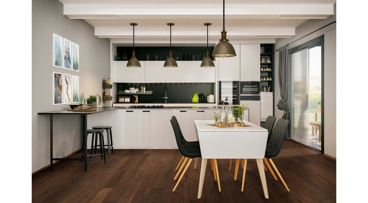 Modern kitchen with white cabinets, black accents, wood floor, and dining table.