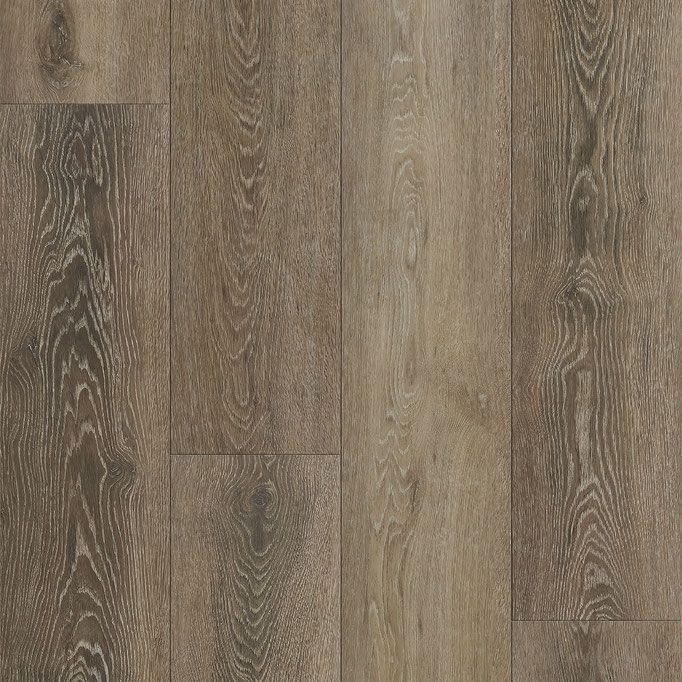 Close-up of wood-look flooring. Brown and tan tones with detailed wood grain.