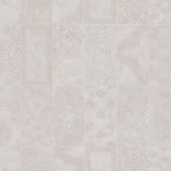 Gray and off-white patterned patchwork tile floor with various detailed designs.