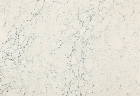 White marble countertop with dark blue veining.