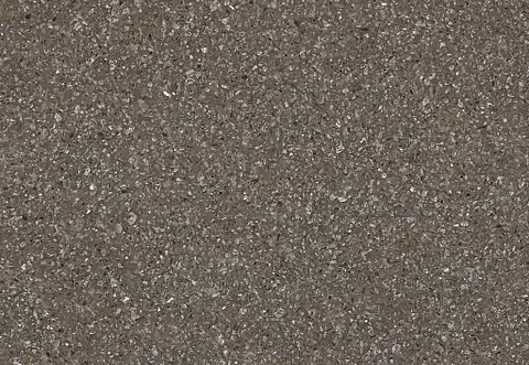 Gray asphalt pavement with small flecks of color.